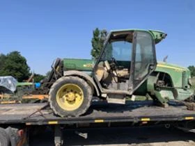      John Deere 3200-  