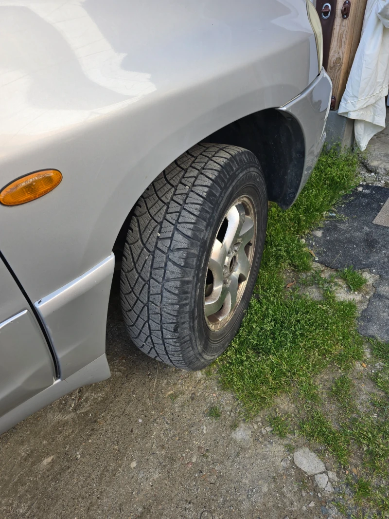 Mazda Tribute, снимка 10 - Автомобили и джипове - 52316761