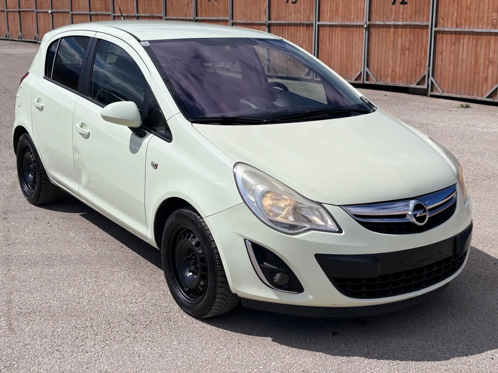 Opel Corsa 1.4i Facelift Euro5b, снимка 7 - Автомобили и джипове - 54121924