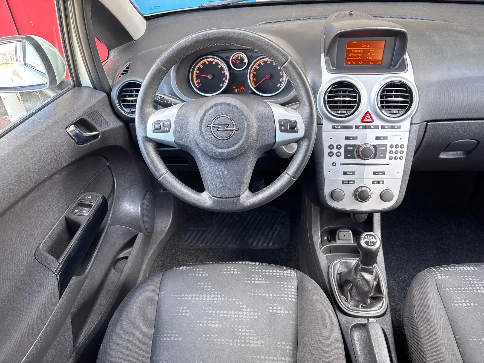 Opel Corsa 1.4i Facelift Euro5b, снимка 11 - Автомобили и джипове - 54121924