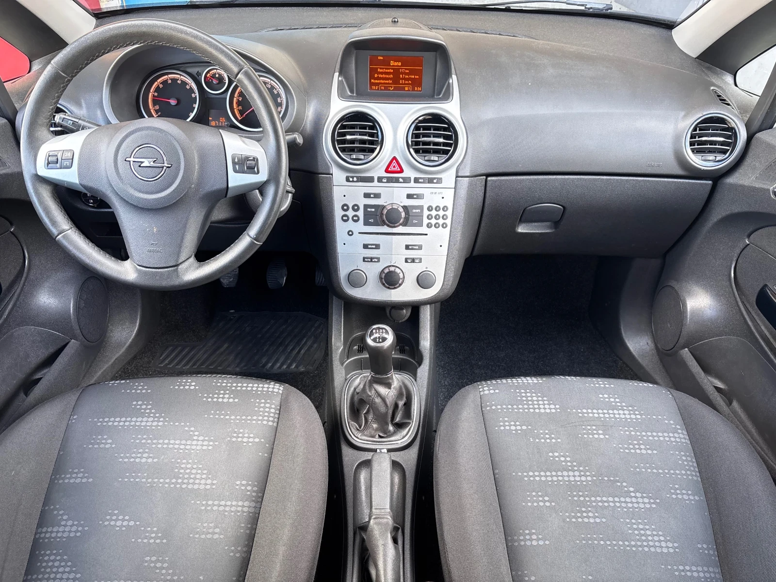 Opel Corsa 1.4i Facelift Euro5b, снимка 10 - Автомобили и джипове - 54121924
