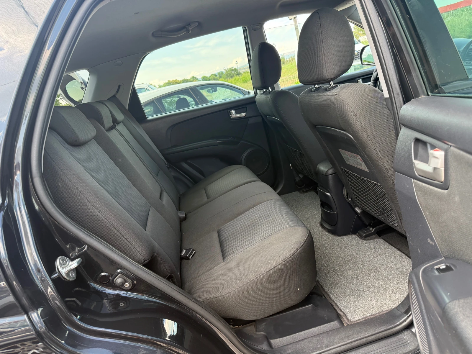 Kia Sportage 2.0i, 140ks, снимка 12 - Автомобили и джипове - 55847619