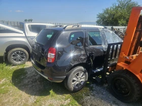 Dacia Duster 1.5dci/1.6i, снимка 14