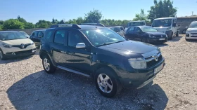 Dacia Duster 1.6i , снимка 3