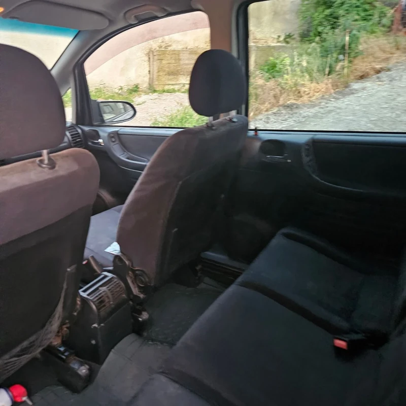 Opel Zafira 1.8 Газ, снимка 8 - Автомобили и джипове - 52877682