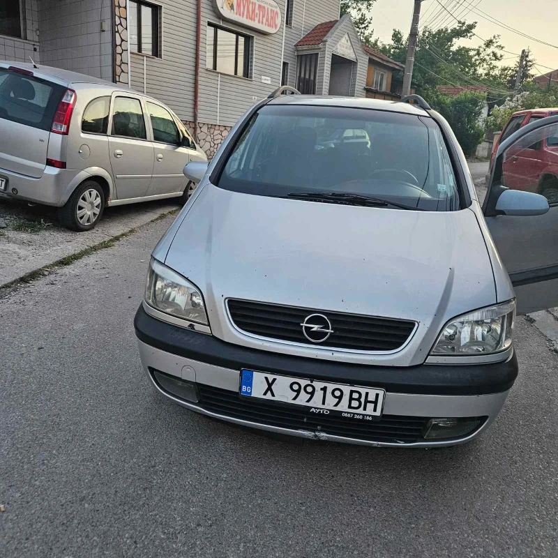Opel Zafira 1.8 Газ, снимка 4 - Автомобили и джипове - 52877682