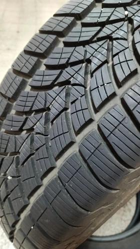 Гуми Зимни 235/60R18, снимка 4 - Гуми и джанти - 47608596