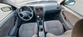 Toyota Avensis, снимка 12 - Автомобили и джипове - 45470652