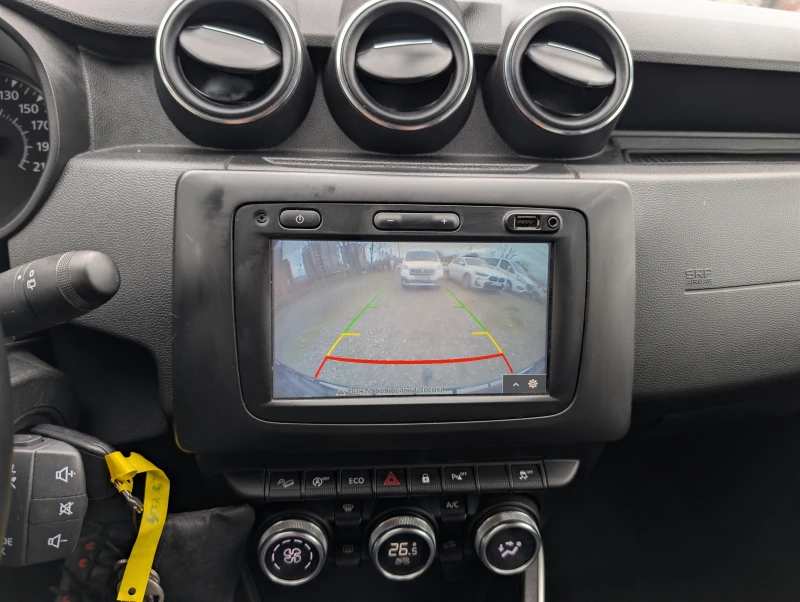 Dacia Duster 1.6i/114ps/4x4, снимка 10 - Автомобили и джипове - 53440800