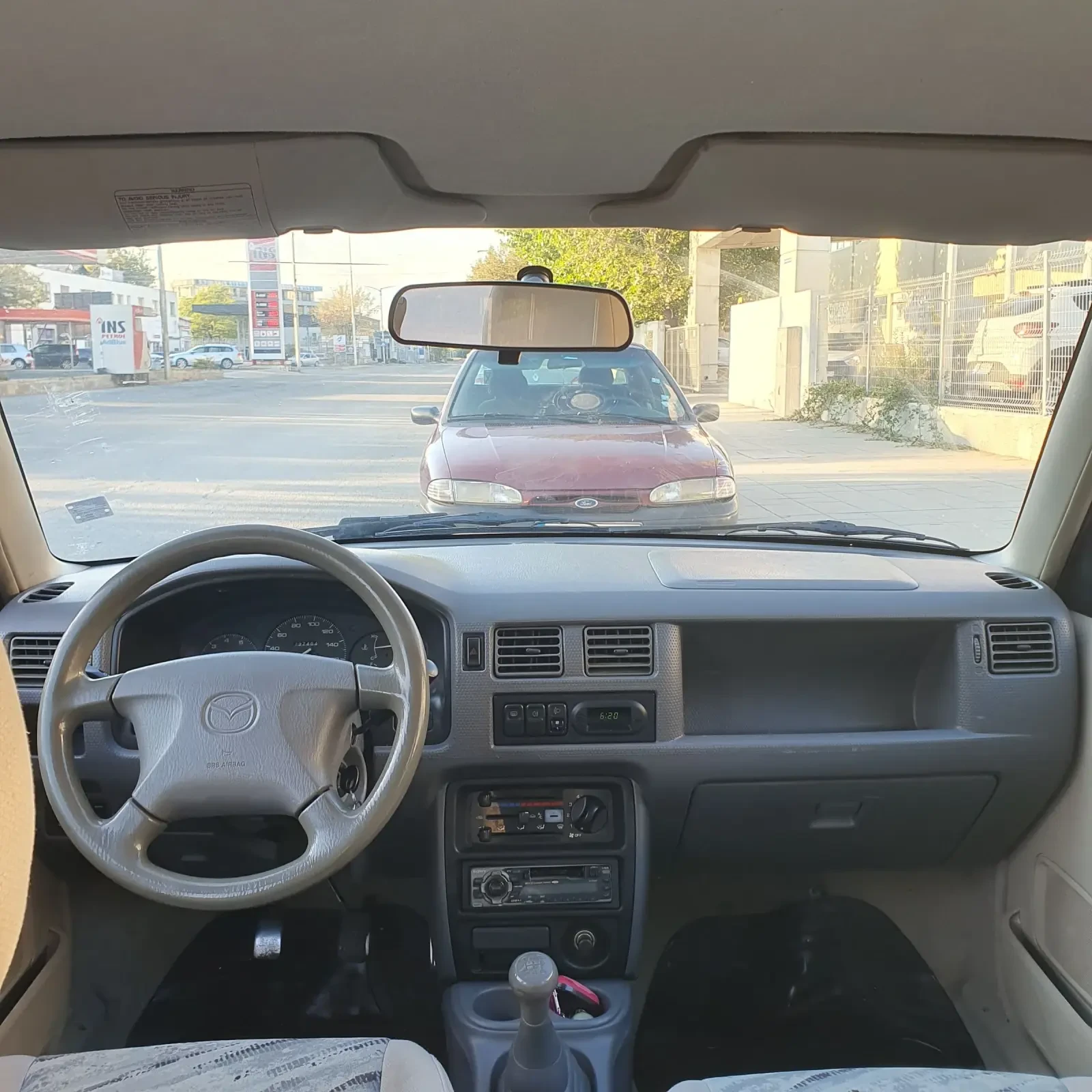 Mazda Demio 1.3i, снимка 12 - Автомобили и джипове - 56111833