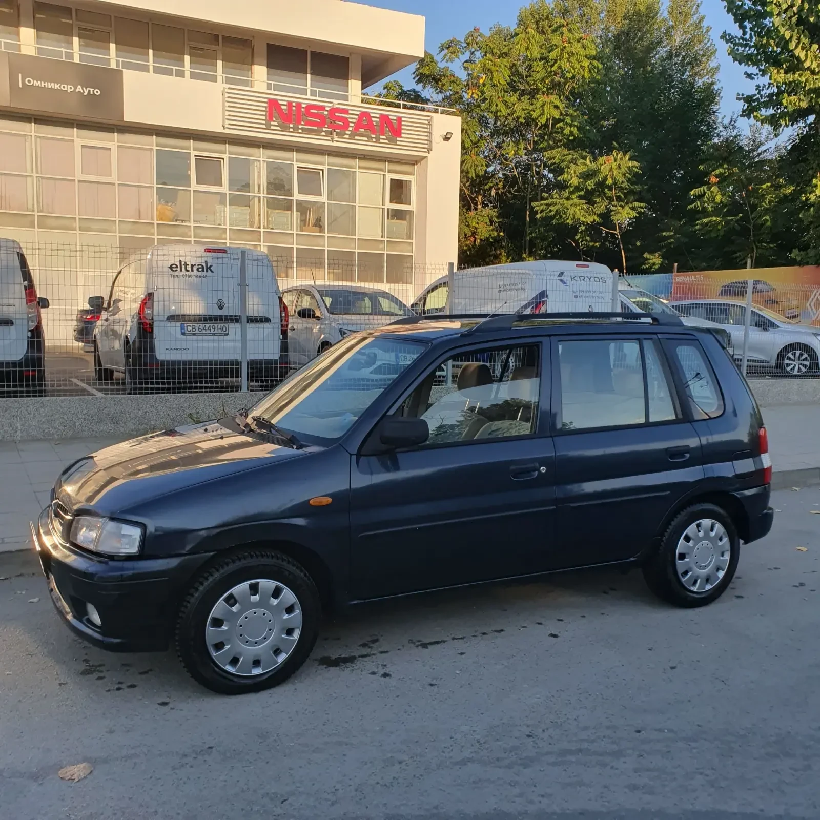 Mazda Demio 1.3i, снимка 2 - Автомобили и джипове - 56111833
