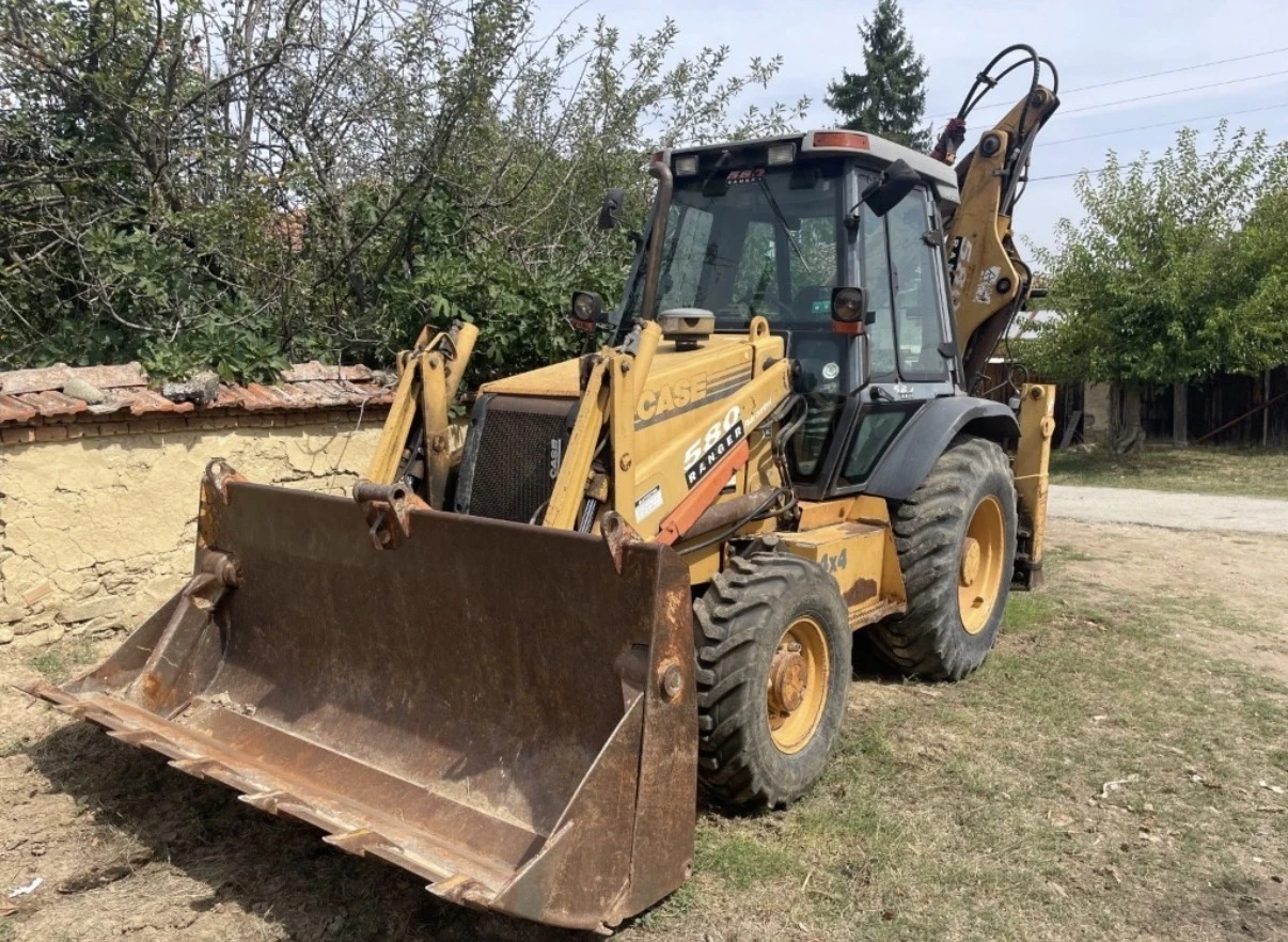 Багер Case 580