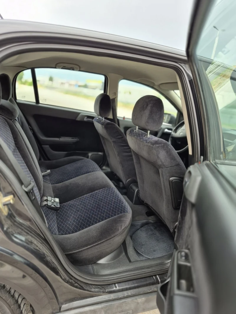 Opel Astra 1.6 Газ/Клима 101 Коня Топ * * * * * , снимка 11 - Автомобили и джипове - 52933239