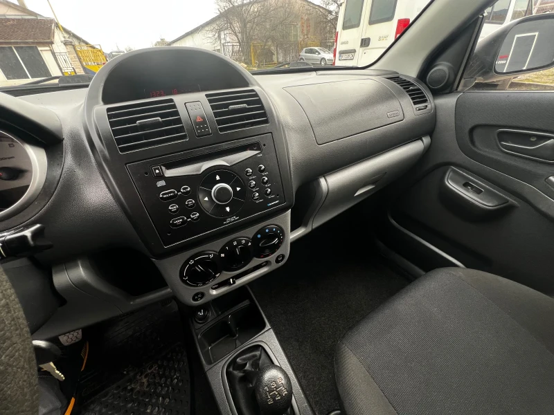 Subaru G3x justy 1.3i 90к.с * 4х4* Климатик* , снимка 13 - Автомобили и джипове - 53496477