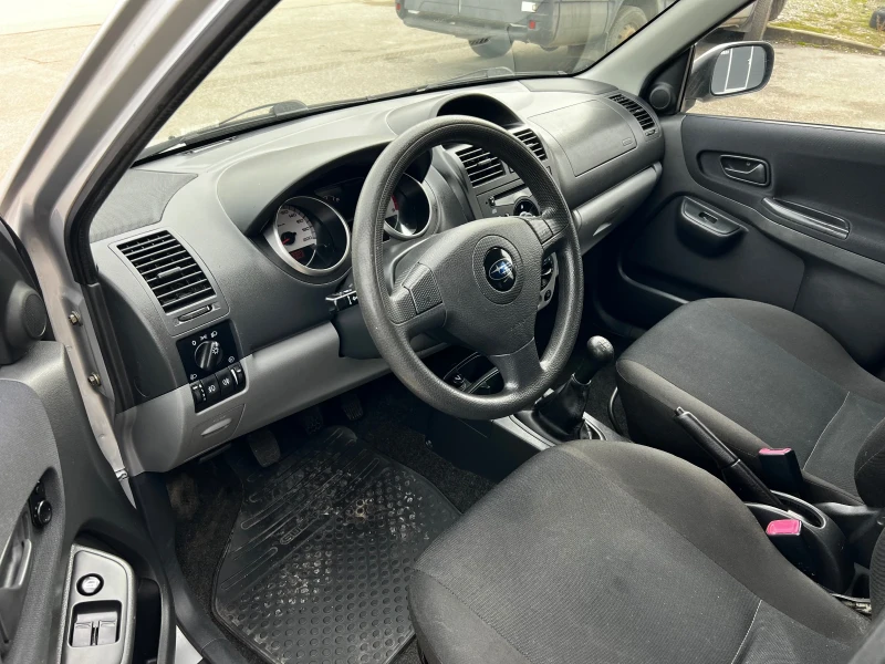 Subaru G3x justy 1.3i 90к.с * 4х4* Климатик* , снимка 9 - Автомобили и джипове - 53496477