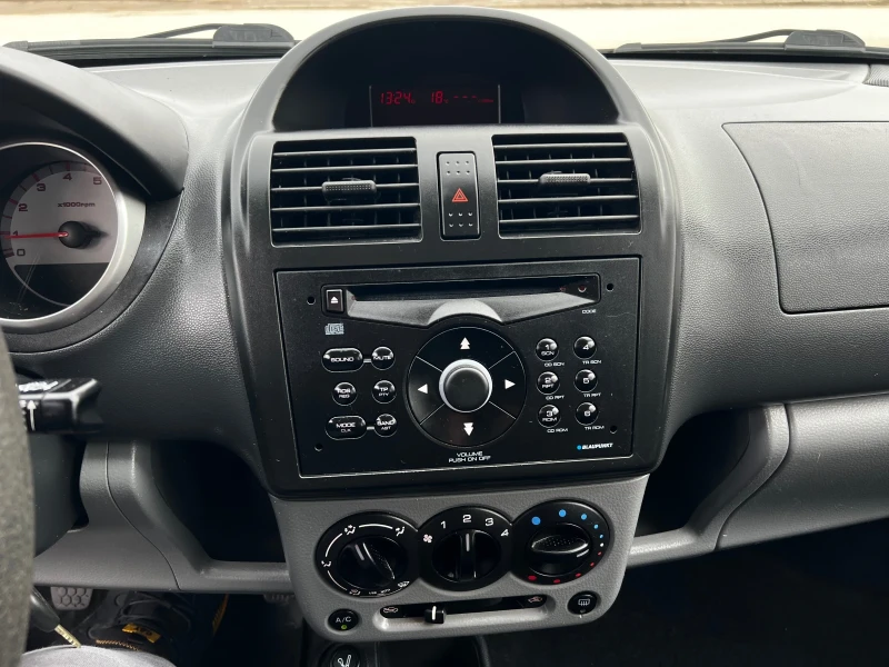 Subaru G3x justy 1.3i 90к.с * 4х4* Климатик* , снимка 14 - Автомобили и джипове - 53496477