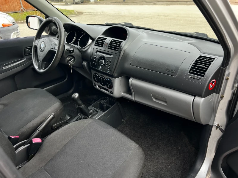 Subaru G3x justy 1.3i 90к.с * 4х4* Климатик* , снимка 11 - Автомобили и джипове - 53496477