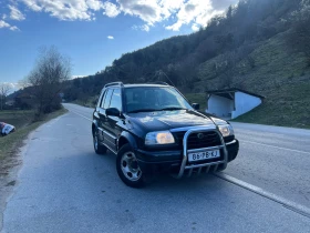 Suzuki Grand vitara 2.5V6* 158кс* Подгрев на седалките* Климатик* Роуб - 4699 € / 9190.45 лв. - 80563557 3