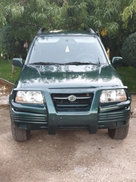     Suzuki Grand vitara 2.0 128 .  !