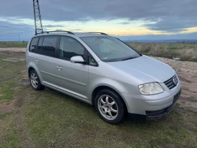 VW Touran 1.9-105 6+ 1 - 3850 лв. / 1968.47 € - 74406459 4