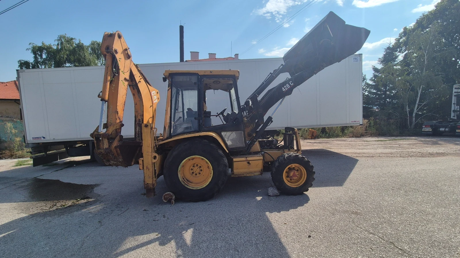 Багер Cat 428C