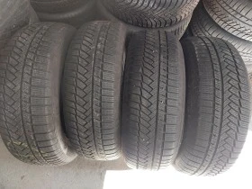 Гуми Зимни 235/65R17, снимка 1 - Гуми и джанти - 38462689