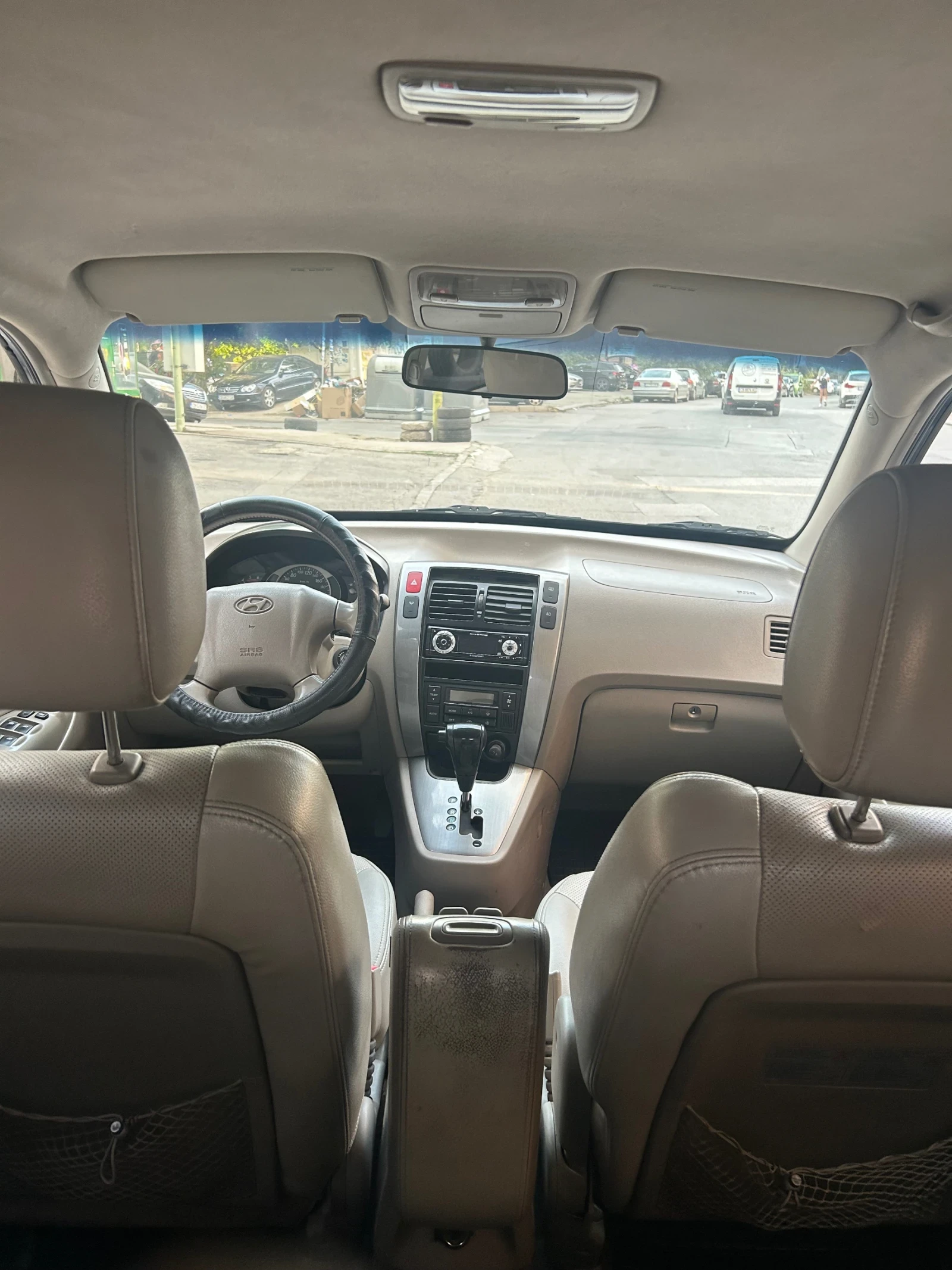 Hyundai Tucson 2.0 CRDI Avtomat 4x4, снимка 11 - Автомобили и джипове - 54272471