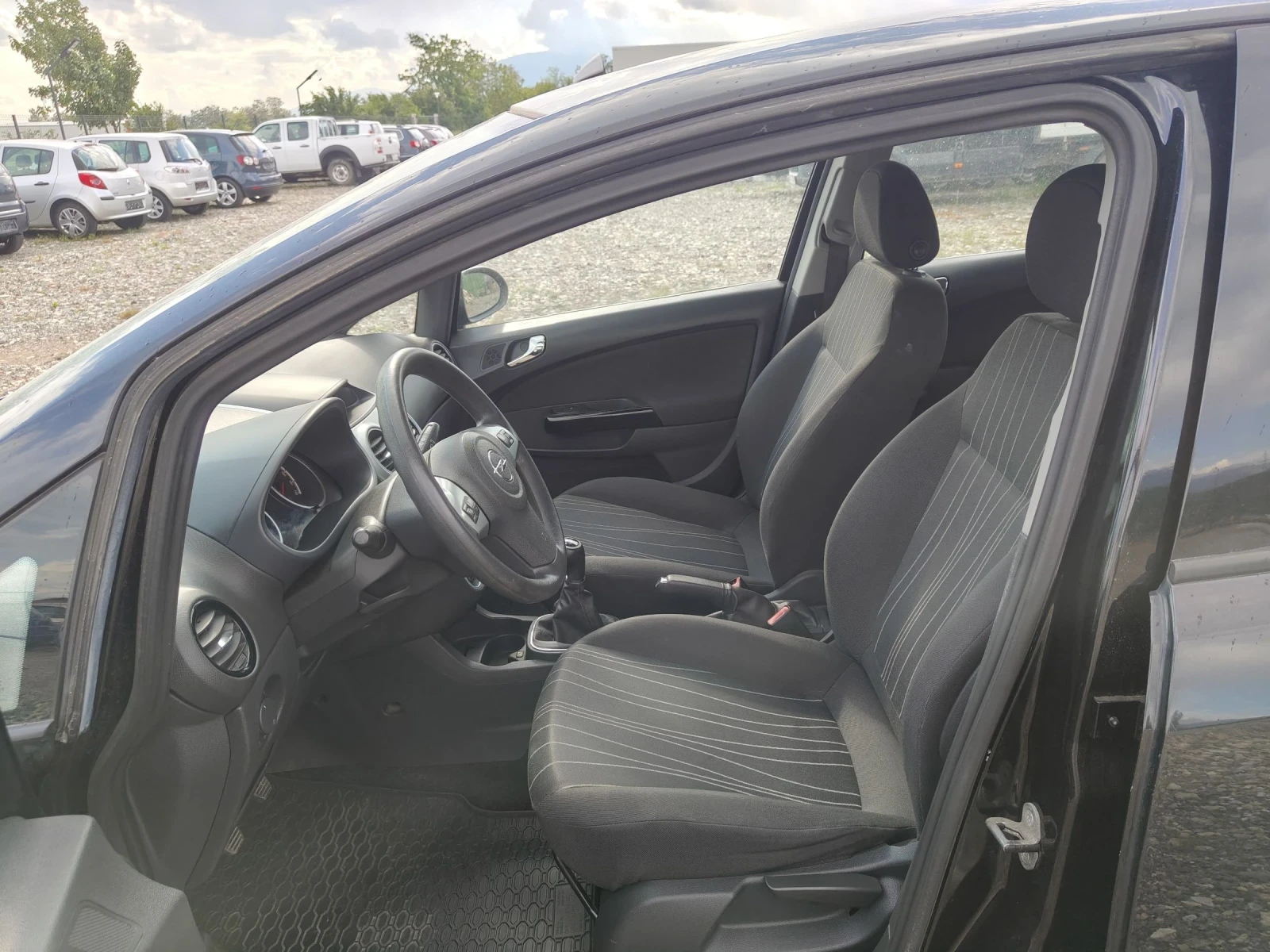 Opel Corsa 1.2i 80, снимка 11 - Автомобили и джипове - 53292483
