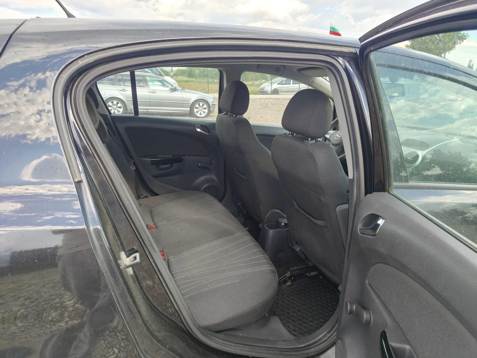 Opel Corsa 1.2i 80, снимка 14 - Автомобили и джипове - 53292483