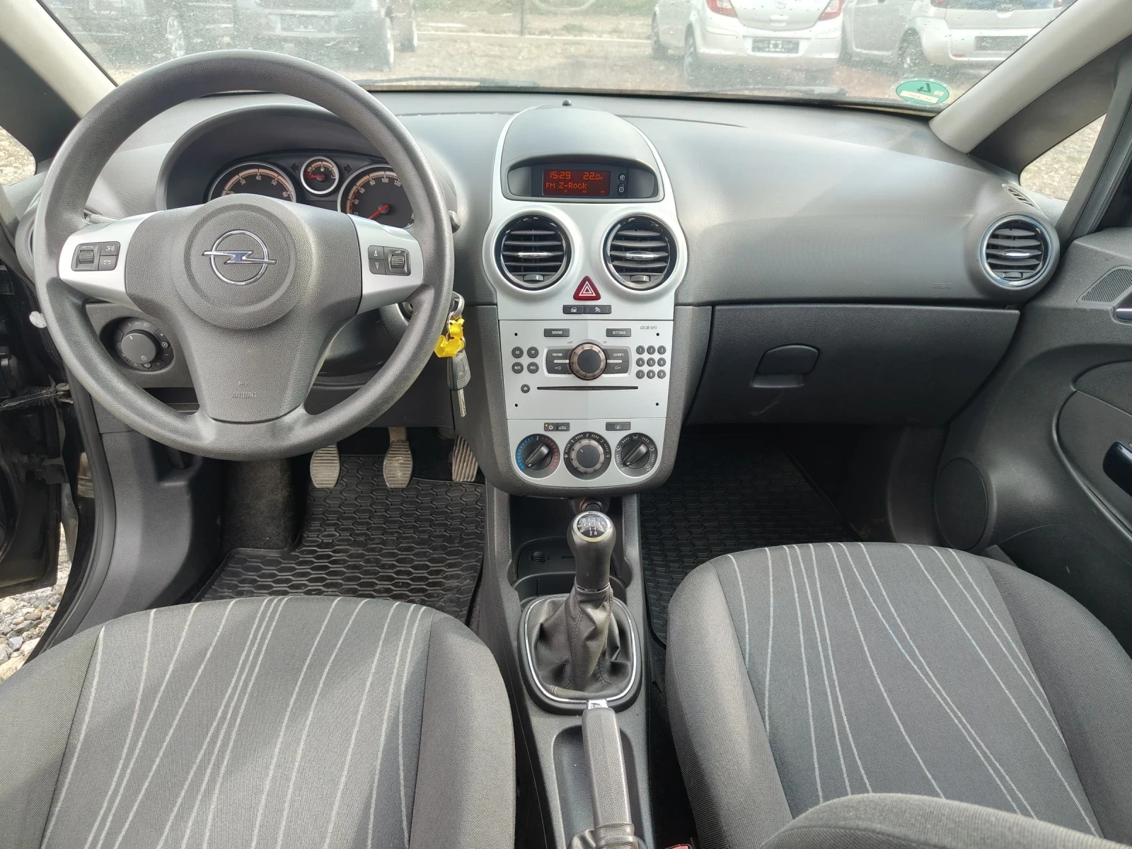 Opel Corsa 1.2i 80, снимка 9 - Автомобили и джипове - 53292483