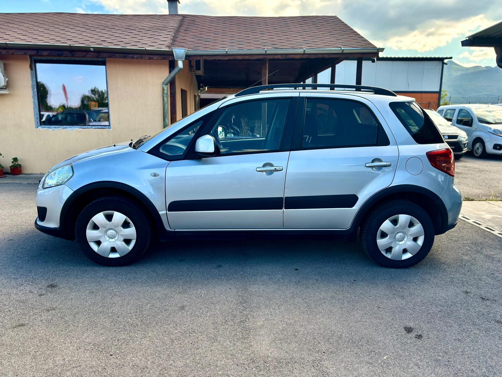 Suzuki SX4  - изображение 5