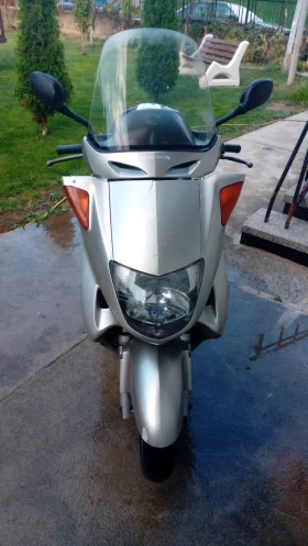 Honda Foresight, снимка 1