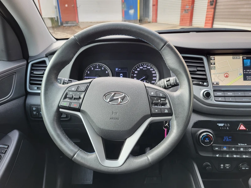 Hyundai Tucson 1.6i, снимка 11 - Автомобили и джипове - 48480015