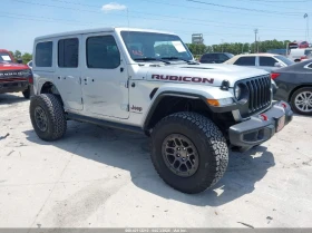 Jeep Wrangler 3.6L V-6 DOHC, VVT, 285HP 4X4 Drive