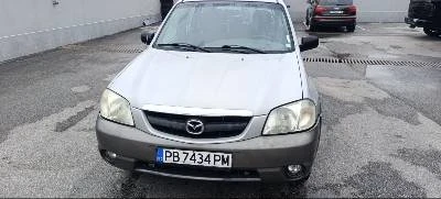 Mazda Tribute, снимка 4 - Автомобили и джипове - 52972413