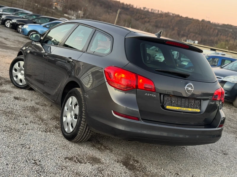 Opel Astra 1.7CDTI 110кс 6ск НАВИ КЛИМА , снимка 4 - Автомобили и джипове - 48622818