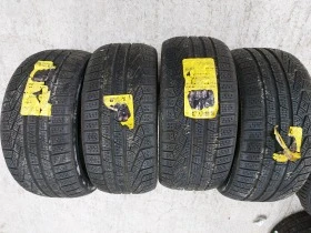      235/40R18