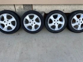        185/55R15  Mazda 2