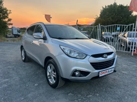     Hyundai IX35 2.0i - 163 . /    /  159 000  