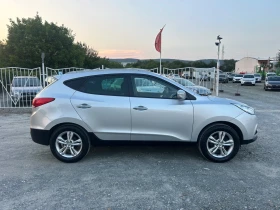     Hyundai IX35 2.0i - 163 . /    /  159 000  