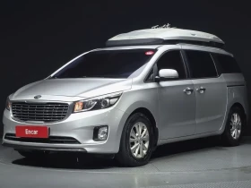 ������ Kia Carnival