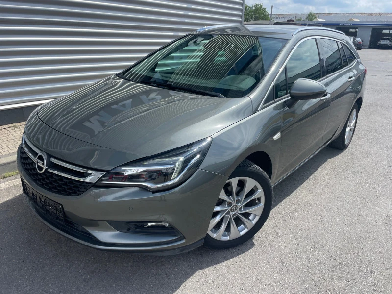 Opel Astra CNG+ Sport Tourer+ 1, 4+ Navi, снимка 1 - Автомобили и джипове - 46455335