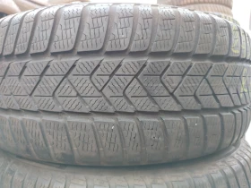 Гуми Зимни 245/45R18, снимка 1 - Гуми и джанти - 47490331