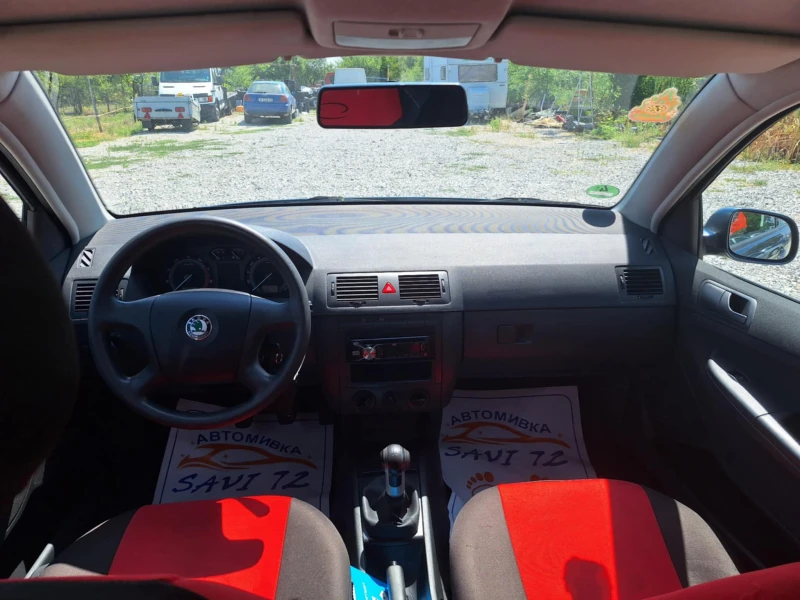 Skoda Fabia 1.4i klima, снимка 11 - Автомобили и джипове - 52079527