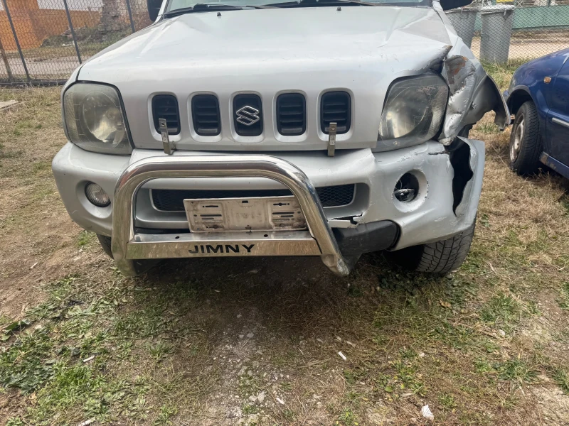 Suzuki Jimny 1.3 клима, снимка 1 - Автомобили и джипове - 48823051