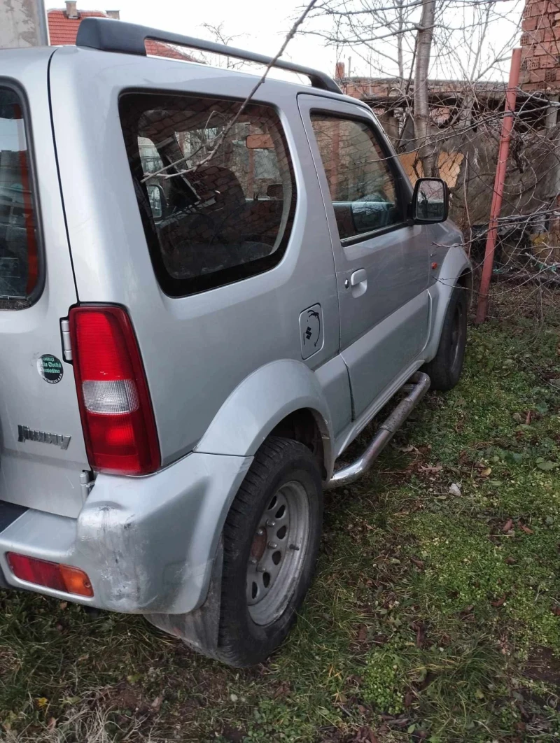 Suzuki Jimny 1.3 клима, снимка 8 - Автомобили и джипове - 48823051