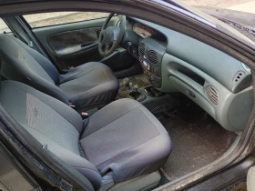 Renault Megane 1.6 Бензин Климатик Нови Гуми  - 900 € / 1760.25 лв. - 36970295 4