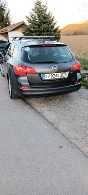 Opel Astra, снимка 14 - Автомобили и джипове - 44855365
