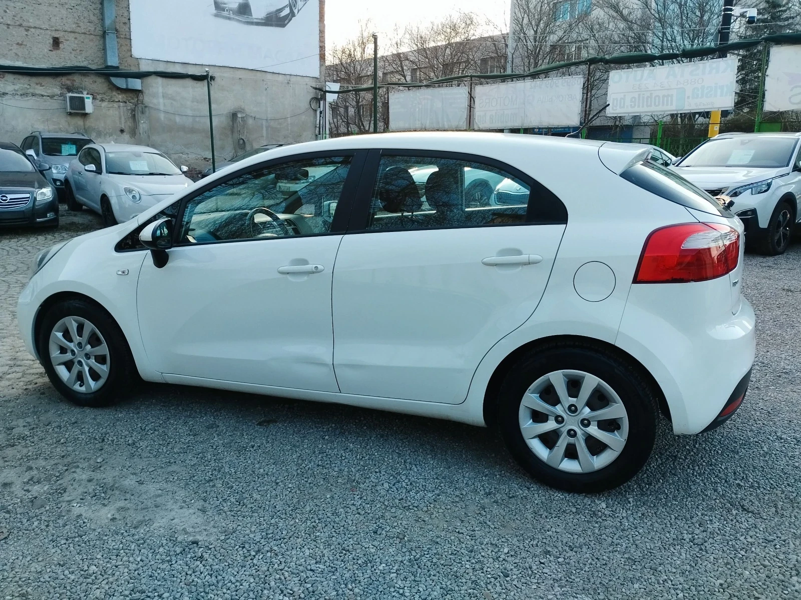 Kia Rio 1.25i BENZIN 84кс, снимка 5 - Автомобили и джипове - 53866467