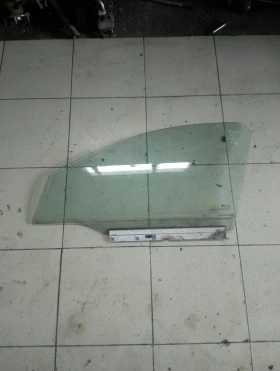 Стъкло предно ляво Опел Корса Ц 4вр.